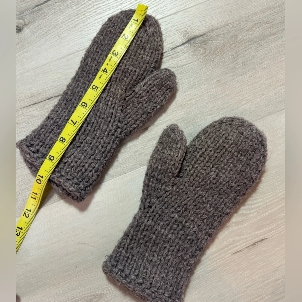 Handcrafted gray cable knit mittens